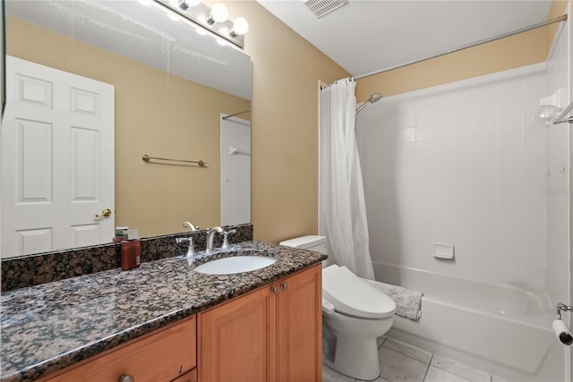 9128 Phillips Grove Ter, Orlando, FL 32836 - full bath featuring vanity, shower / bath combo with shower curtain, and tile patterned flooring