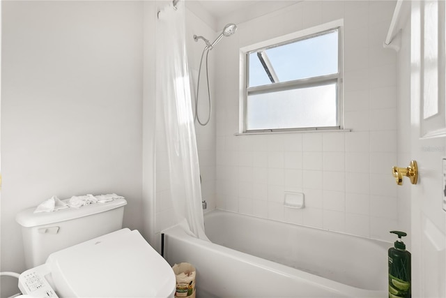 9128 Phillips Grove Ter, Orlando, FL 32836 - bathroom featuring shower / bathtub combination with curtain and toilet