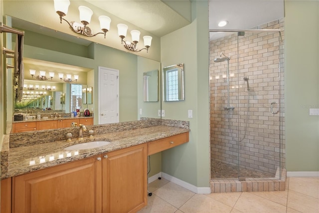 9128 Phillips Grove Ter, Orlando, FL 32836 - bathroom featuring a stall shower, vanity, and tile patterned flooring