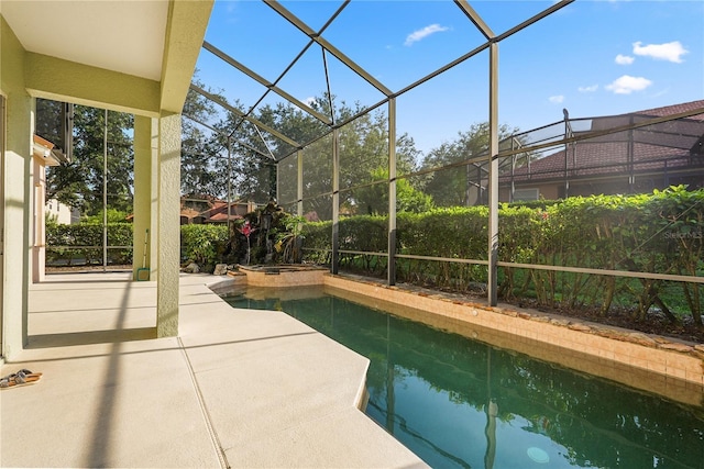 9128 Phillips Grove Ter, Orlando, FL 32836 - view of swimming pool featuring a patio, a lanai, and a pool with connected hot tub