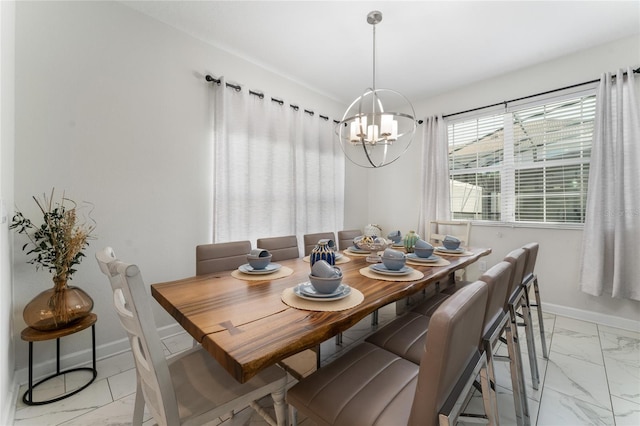 4974 Windermere Ave, Kissimmee, FL 34746 - dining area featuring light marble finish flooring and a chandelier