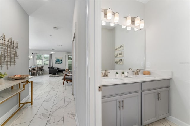4974 Windermere Ave, Kissimmee, FL 34746 - full bath featuring marble look tiles and double vanity