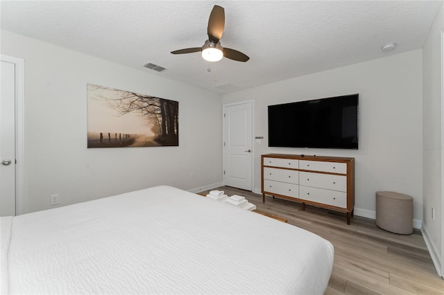 4974 Windermere Ave, Kissimmee, FL 34746 - bedroom with light wood-type flooring and ceiling fan