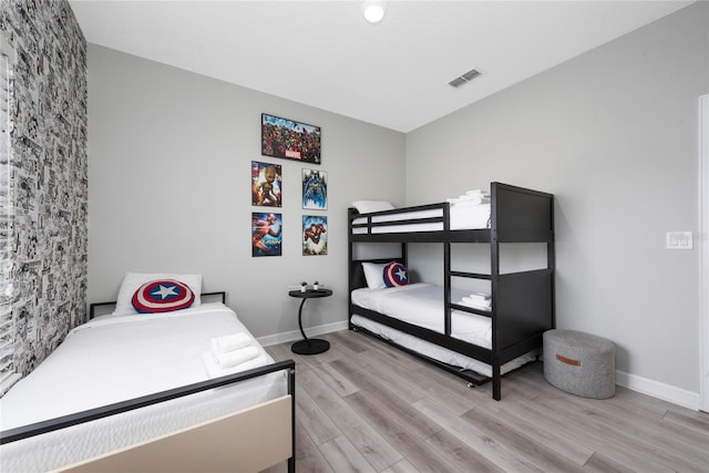 4974 Windermere Ave, Kissimmee, FL 34746 - bedroom featuring wood finished floors and baseboards