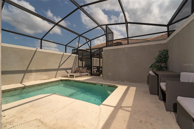 4974 Windermere Ave, Kissimmee, FL 34746 - swimming pool with a patio and glass enclosure