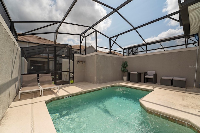 4974 Windermere Ave, Kissimmee, FL 34746 - swimming pool with a patio and a lanai
