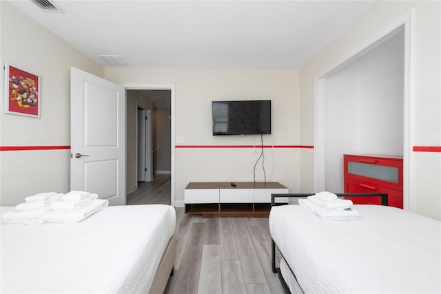 4974 Windermere Ave, Kissimmee, FL 34746 - bedroom featuring light wood-style flooring