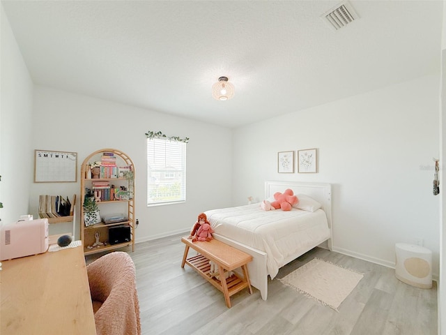 13993 Title Way, Winter Garden, FL 34787 - bedroom featuring light wood-style flooring and an office area