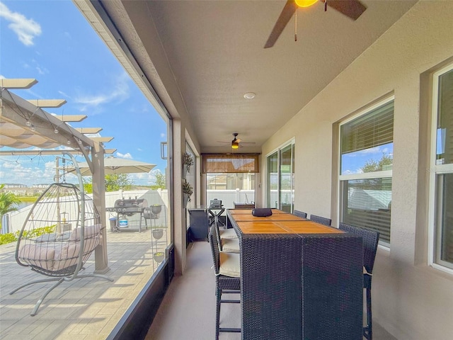 13993 Title Way, Winter Garden, FL 34787 - sunroom with a ceiling fan and outdoor dining space