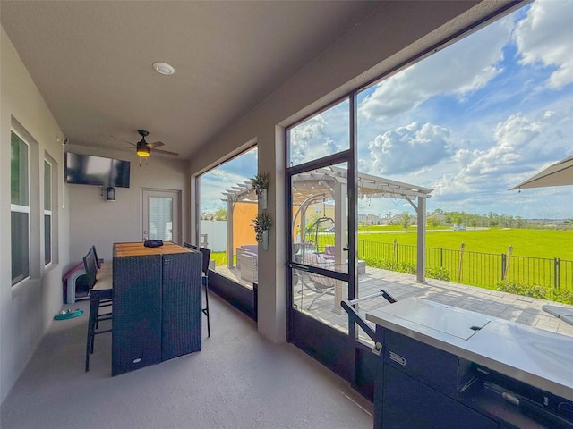 13993 Title Way, Winter Garden, FL 34787 - sunroom / solarium with a ceiling fan and outdoor dining area
