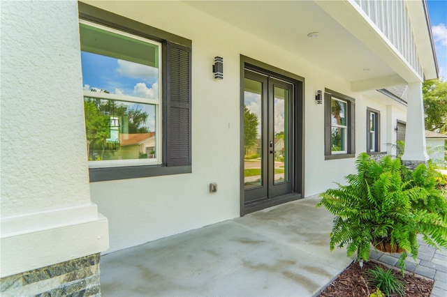 1006 Linkside Ct, Apopka, FL 32712 - doorway to property featuring stucco siding and french doors