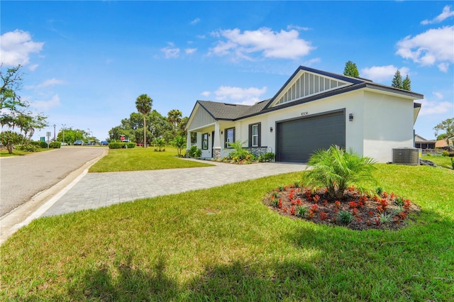 1006 Linkside Ct, Apopka, FL 32712 - view of front of property featuring decorative driveway, a front lawn, stucco siding, and a garage