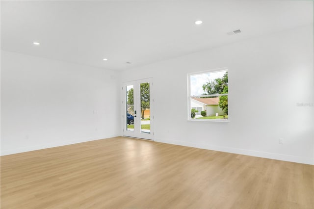 1006 Linkside Ct, Apopka, FL 32712 - spare room featuring light wood finished floors and recessed lighting