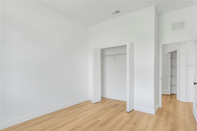 1006 Linkside Ct, Apopka, FL 32712 - unfurnished bedroom with light wood finished floors and baseboards