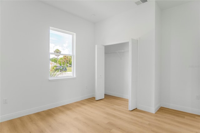 1006 Linkside Ct, Apopka, FL 32712 - unfurnished bedroom featuring light wood-type flooring and a closet
