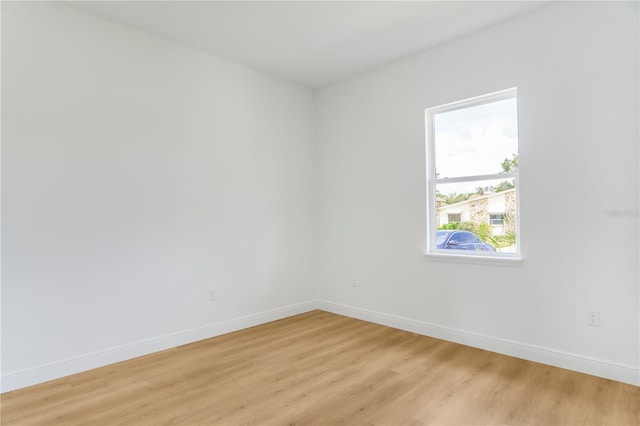 1006 Linkside Ct, Apopka, FL 32712 - spare room with light wood-style flooring and baseboards