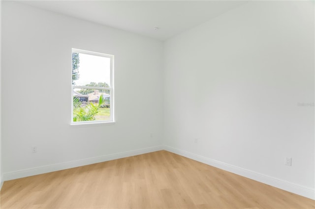 1006 Linkside Ct, Apopka, FL 32712 - spare room featuring light wood-style flooring and baseboards