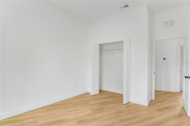 1006 Linkside Ct, Apopka, FL 32712 - unfurnished bedroom featuring light wood-style flooring and a closet