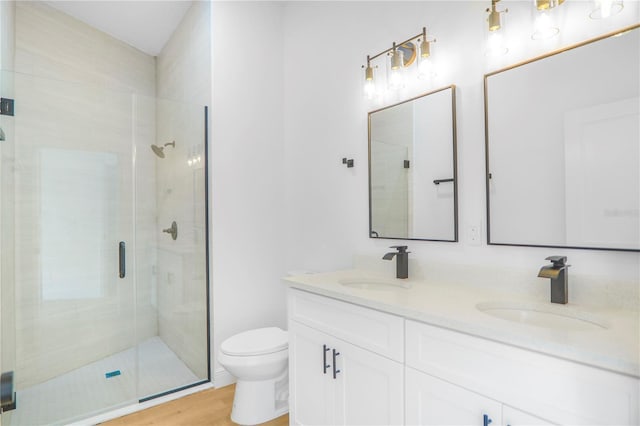 1006 Linkside Ct, Apopka, FL 32712 - full bath featuring a stall shower, double vanity, and wood finished floors