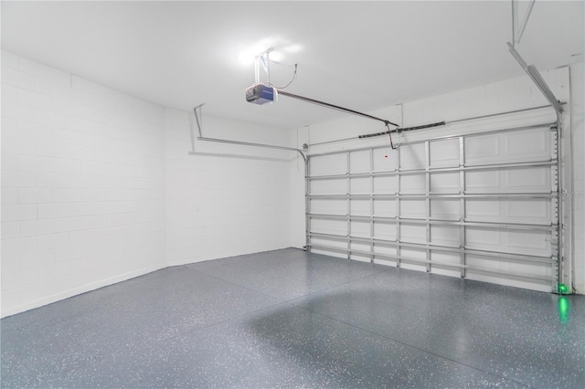 1006 Linkside Ct, Apopka, FL 32712 - garage featuring concrete block wall and a garage door opener