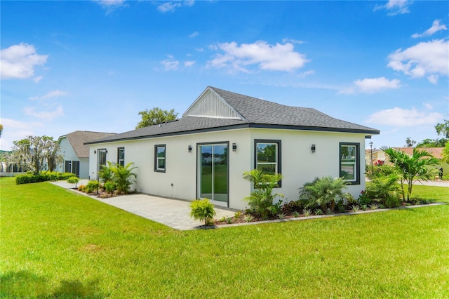 1006 Linkside Ct, Apopka, FL 32712 - rear view of property featuring stucco siding, a patio, a yard, and roof with shingles