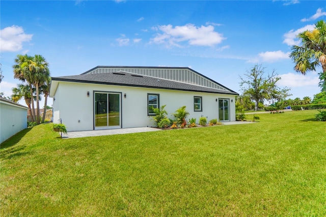 1006 Linkside Ct, Apopka, FL 32712 - rear view of property with a lawn, a patio, and stucco siding
