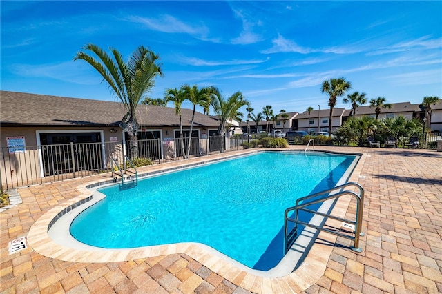 1042 Mollie Ln Unit 81042, Melbourne, FL 32935 - community pool with a residential view and a patio