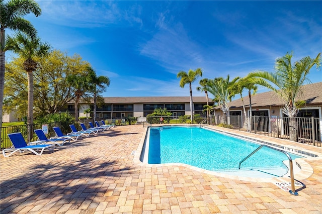 1042 Mollie Ln Unit 81042, Melbourne, FL 32935 - community pool featuring a patio