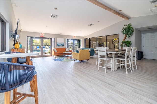 1042 Mollie Ln Unit 81042, Melbourne, FL 32935 - living room with french doors and light wood finished floors