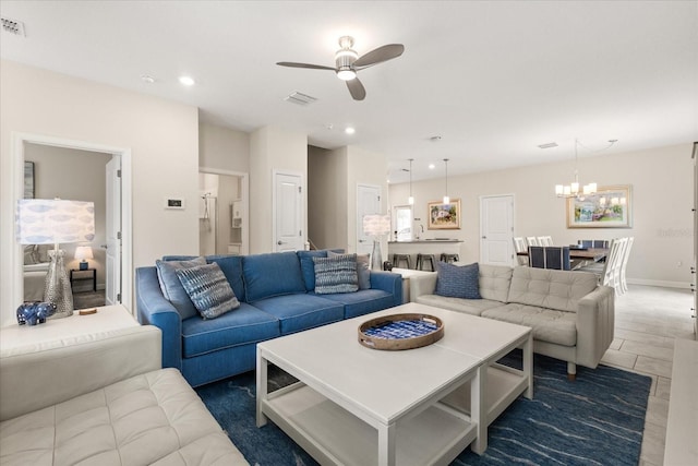 1351 Shinnecock Hills Dr, Davenport, FL 33896 - living area with a chandelier, a ceiling fan, and recessed lighting