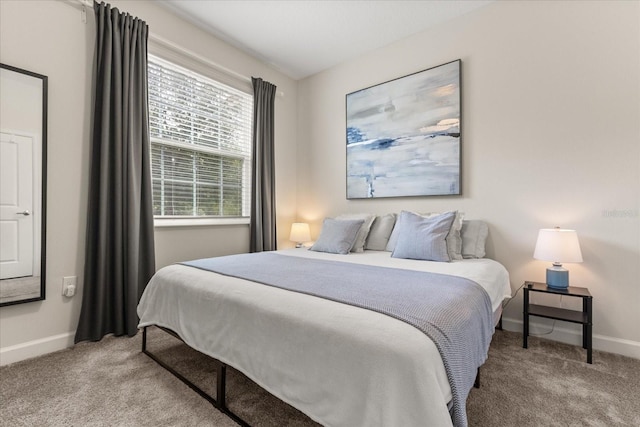 1351 Shinnecock Hills Dr, Davenport, FL 33896 - bedroom featuring carpet floors and baseboards
