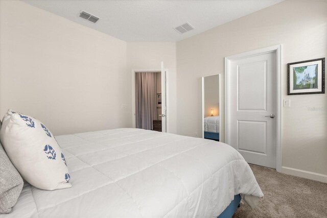 1351 Shinnecock Hills Dr, Davenport, FL 33896 - carpeted bedroom featuring baseboards