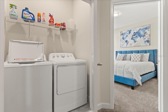 1351 Shinnecock Hills Dr, Davenport, FL 33896 - laundry area featuring washing machine and clothes dryer and carpet floors