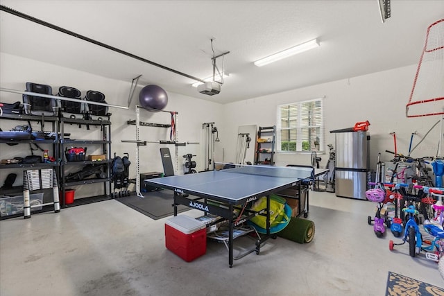 1351 Shinnecock Hills Dr, Davenport, FL 33896 - rec room with a garage and concrete floors