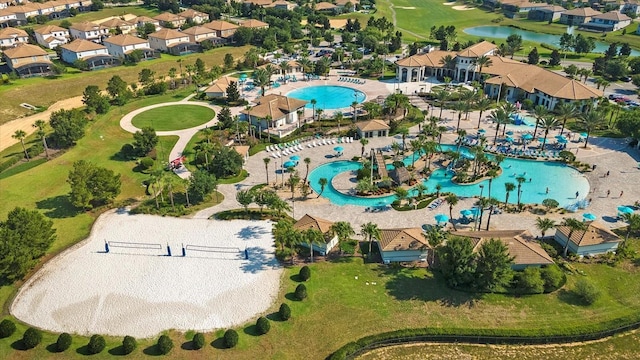1351 Shinnecock Hills Dr, Davenport, FL 33896 - aerial view of residential area with a local golf course and a nearby body of water