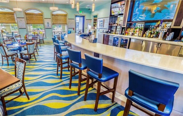 1351 Shinnecock Hills Dr, Davenport, FL 33896 - indoor dry bar with pendant lighting