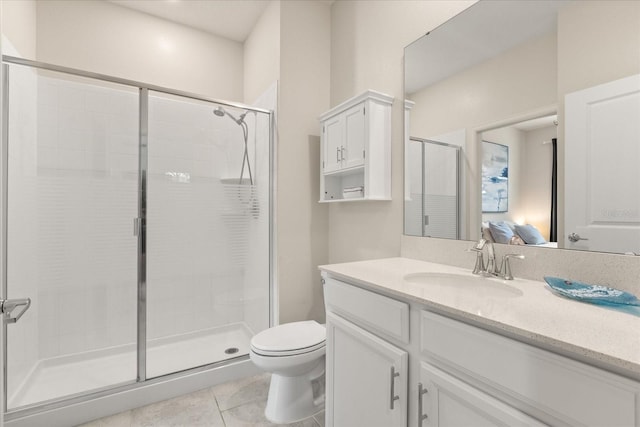 1351 Shinnecock Hills Dr, Davenport, FL 33896 - full bathroom featuring a shower stall, vanity, and tile patterned floors