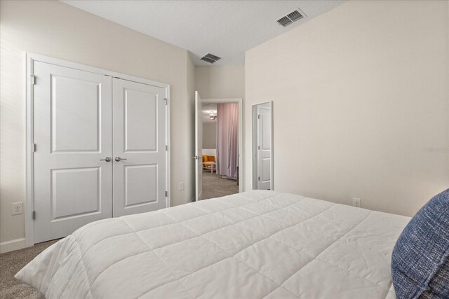 1351 Shinnecock Hills Dr, Davenport, FL 33896 - carpeted bedroom featuring baseboards and a closet