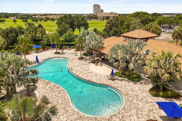 1351 Shinnecock Hills Dr, Davenport, FL 33896 - community pool with a patio