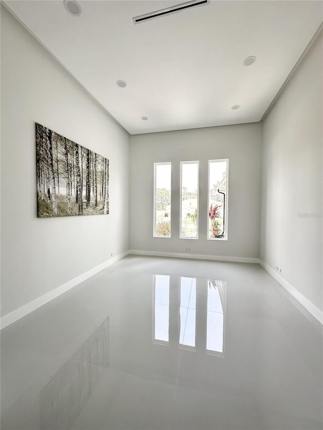 9 Edison Ln, Palm Coast, FL 32164 - spare room featuring baseboards