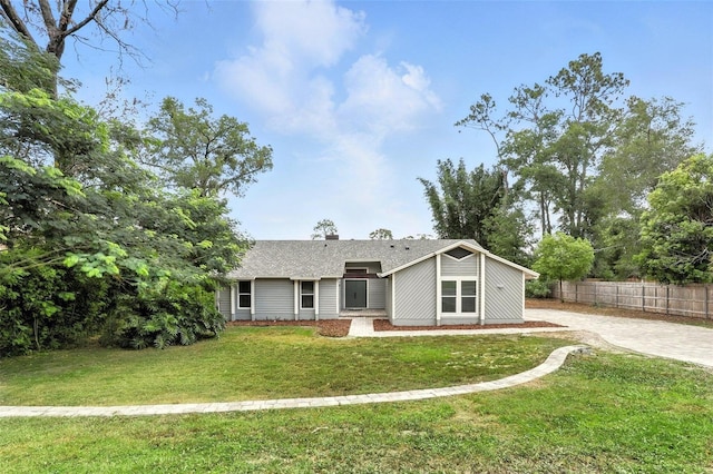 1850 N St, Longwood, FL 32750 - view of front of home featuring roof with shingles and driveway