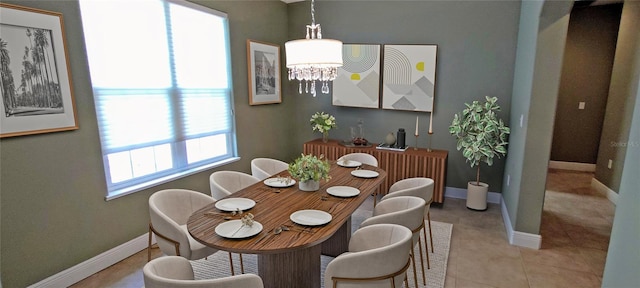 5595 Schefflera, Grant, FL 32949 - dining area featuring light tile patterned flooring and a chandelier