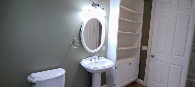 5595 Schefflera, Grant, FL 32949 - half bathroom featuring toilet