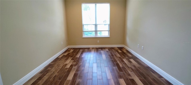 5595 Schefflera, Grant, FL 32949 - spare room with dark wood finished floors