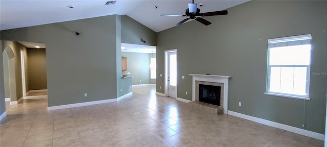 5595 Schefflera, Grant, FL 32949 - unfurnished living room with high vaulted ceiling, ceiling fan, a fireplace, and light tile patterned floors