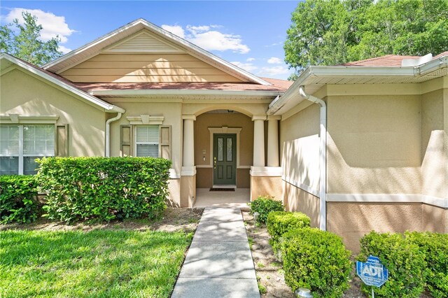 2613 Breezy Meadow Rd, Apopka, FL 32712 - property entrance with stucco siding