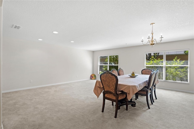 2613 Breezy Meadow Rd, Apopka, FL 32712 - dining area with a chandelier, light colored carpet, a textured ceiling, and recessed lighting