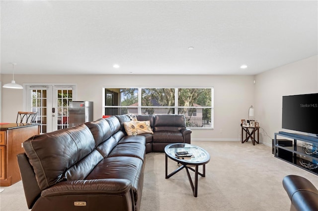 2613 Breezy Meadow Rd, Apopka, FL 32712 - living room with light carpet, french doors, plenty of natural light, and recessed lighting