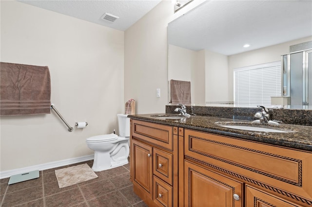 2613 Breezy Meadow Rd, Apopka, FL 32712 - bathroom featuring double vanity and a shower with shower door
