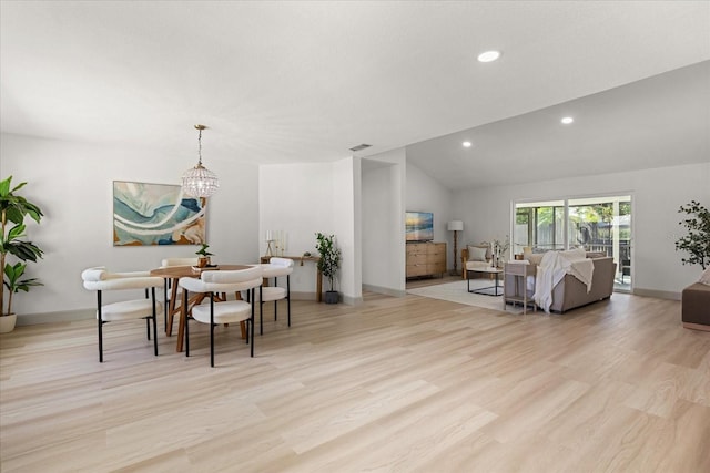 1030 Huntington Ct, Longwood, FL 32750 - dining area with recessed lighting, light wood-style floors, a chandelier, and vaulted ceiling